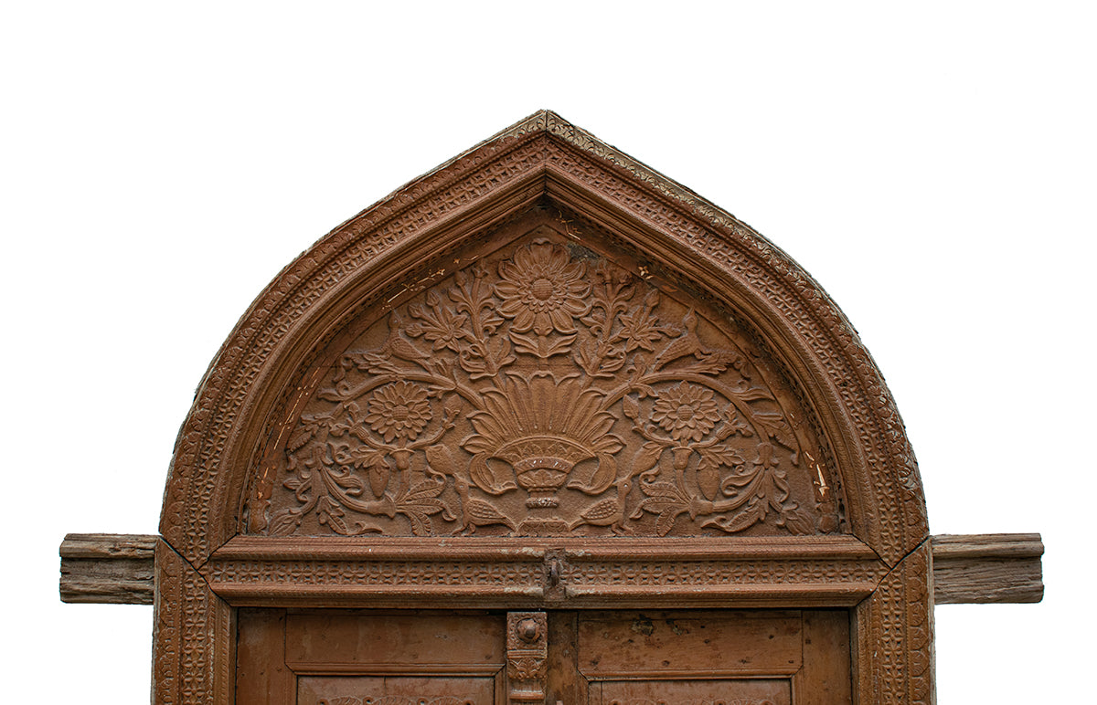 Arched Double Door with Floral Tympanum and Sunburst Panels